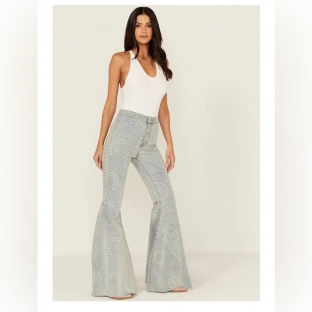 Free People  Just Float On Flare Jeans in Geo Print